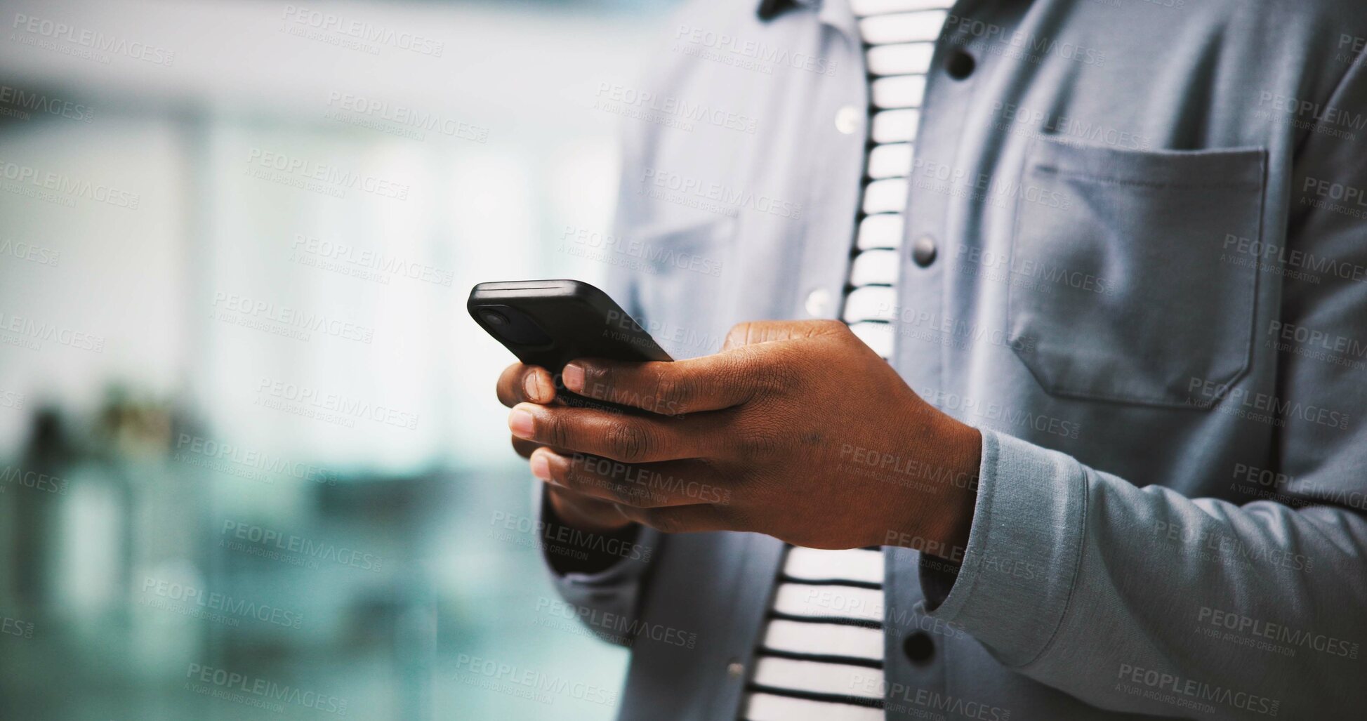 Buy stock photo Typing, hands and man in office with mobile, online communication or content plan for client. Productivity, digital or marketing consultant in agency with tech, stakeholder chat or update on email.