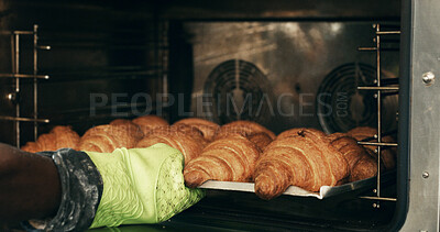 Buy stock photo Croissant, hands and oven with baker in kitchen for cooking, culinary process or food production. Health, wheat and baking with person in coffee shop for catering, restaurant and small business owner