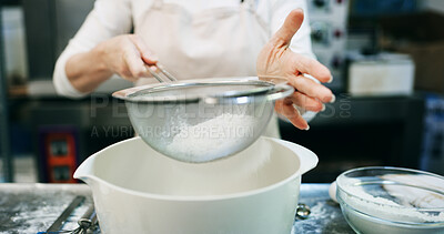 Buy stock photo Hands, baking and flour sieve in kitchen for meal prep, culinary process or pastry chef. Mesh equipment, bakery or woman cooking food for catering, recipe or powder with ingredients in small business