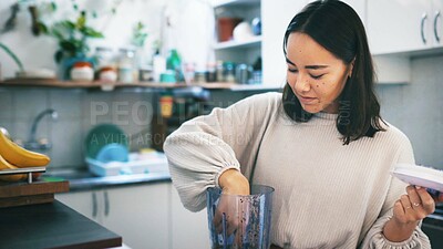 Buy stock photo Asian woman, blender and smoothie for health in kitchen, detox diet or wellness. Fruit mixer, home or person with appliance for drink preparation, vegan ingredients or nutrition with organic benefits