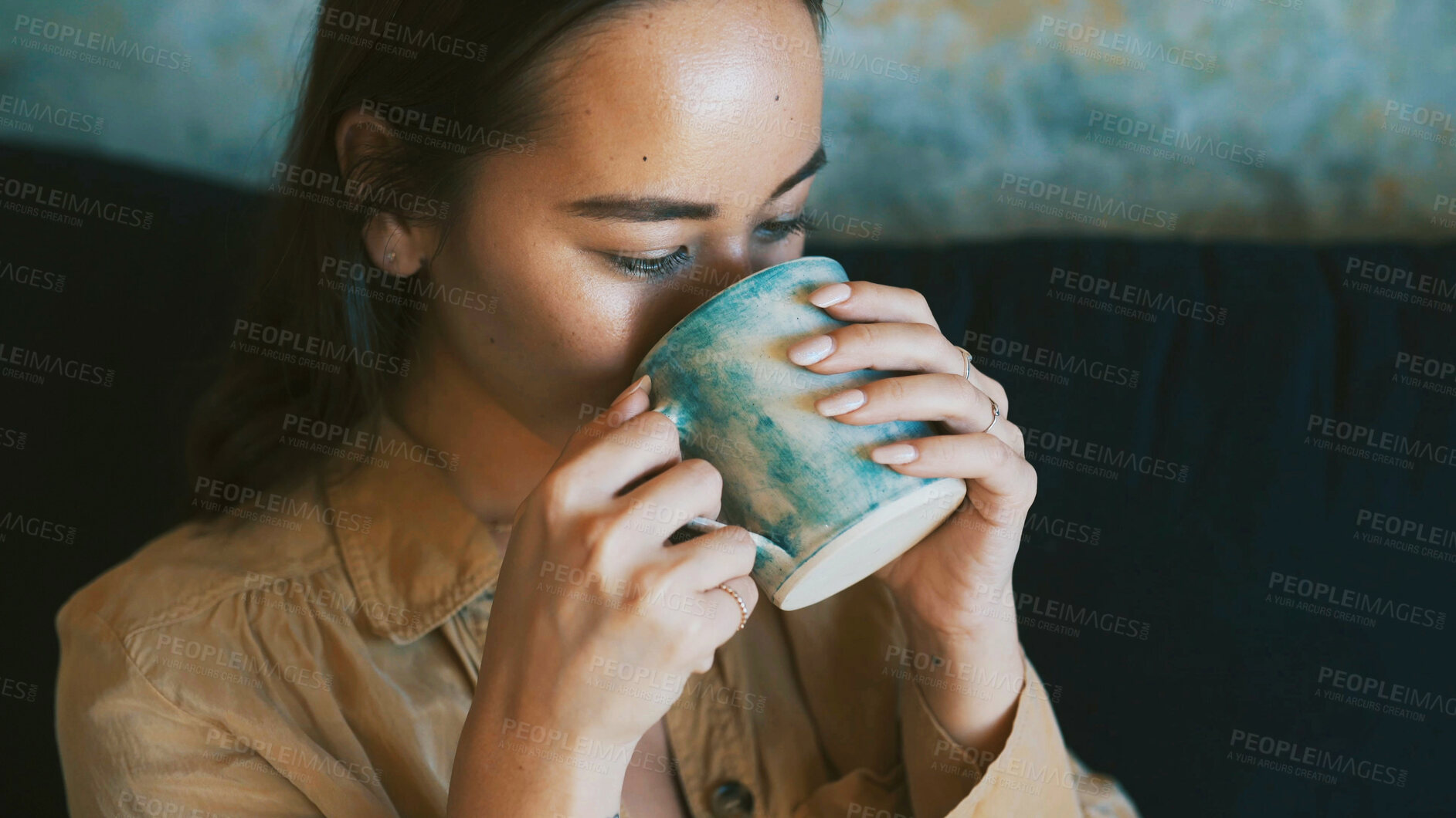 Buy stock photo Drinking, sofa and woman with coffee in home for wellness, calm and peace in morning. Aesthetic, living room and person with beverage, herbal tea and mug for relax, comfort and resting on weekend