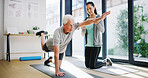 Fitness, pilates and personal trainer with senior man in studio for health, stretching or wellness. Exercise, yoga and coach with elderly male person for table pose for balance with workout together.