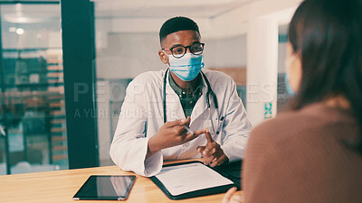 Buy stock photo Man, doctor and consultation with patient in hospital for healthcare feedback, help or results. Mask, medical professional and talk to woman in office for checkup, treatment plan and diagnosis update