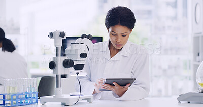 Buy stock photo Woman, scientist and research with tablet in lab for notes, medical study and experiment results. Person, coworking and microscope with digital checklist, online report and review feedback on vaccine