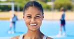 Hockey, happy and portrait of woman outdoor with smile for training, practice and exercise for competition. Sports team, fitness and person with confidence for match, game and tournament for hobby