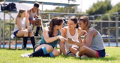 Buy stock photo Sports, outdoor and women with smartphone, relax and conversation with game results. Online chatting, group and friends on grass field, cellphone and communication with fitness, connection and break