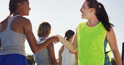Buy stock photo Sport, team and women with handshake outdoor for hockey tournament, game start and greeting. Fitness, happy and players shaking hands at competition for sportsmanship, friendly match or introduction