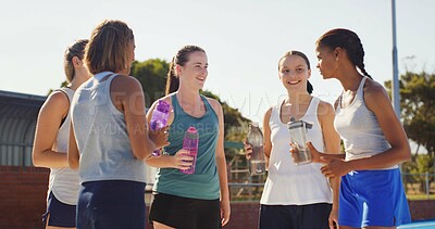 Buy stock photo Sports, water bottle and outdoor with women, team and hydration with wellness, thirsty and smile. Players, happy people and friends with liquid, training and break with exercise, practice and resting