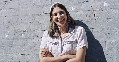 Buy stock photo Portrait, wall and happy woman in city, arms crossed and fashion with confidence, holiday and calm. Funny, outdoor and person with pride, stylish clothes and casual outfit with vacation and trendy