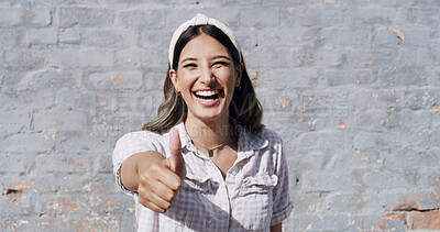 Buy stock photo Happy woman, portrait and brick wall with thumbs up for fashion, style or feedback review on space. Female person, urban and smile with like emoji, yes sign or OK for vote, agree or opinion on mockup