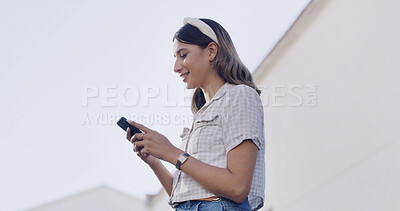 Buy stock photo Reading, smile and woman outdoor with phone, post reaction and communication update on chat site. Happy, digital and female person in city with mobile, scroll and online message on social media app.