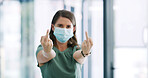 Woman, face mask and middle finger at office, portrait and angry with rude emoji, rejection or disagree. Person, symbol and icon with hand gesture, ppe and frustrated with virus at workplace in Spain