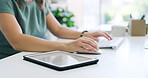 Keyboard, tablet and businesswoman in office with typing for research on finance report with budget. Technology, hands and female financial advisor working online for investment proposal in workplace