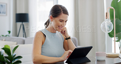 Buy stock photo Streaming, smile and woman at table with tablet, scroll and search for digital entertainment. Happy, video choice and female person at house with tech, multimedia and online show in binge session.