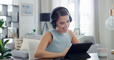 Buy stock photo Headphones, woman and happy with tablet in home for streaming movie, online series or audiobook. Relax, person and smile with tech in apartment for watching video, social media and weekend break