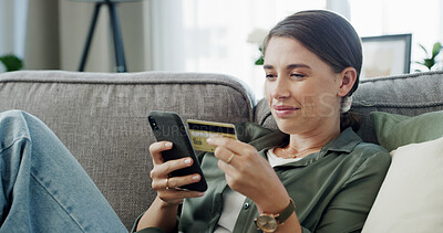Buy stock photo Credit card, phone and woman in home for online shopping, internet purchase and student payment. Ecommerce, technology and person on house sofa for application fee, scholarship or college funding