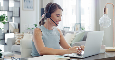 Buy stock photo Headset, laptop and woman typing in home living room for customer service or remote work. Communication, computer and support with of freelance employee in apartment for help as virtual assistant