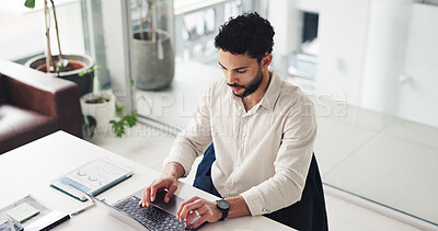 Buy stock photo Man, typing and laptop at startup, report and project management in office at media company. Person, writer or editor with pc, article and above for review with web traffic stats at creative agency