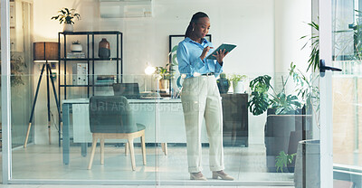 Buy stock photo Business, tablet and window with black woman in office for development, planning or research. App, digital technology and glass with African employee in professional workplace for company management