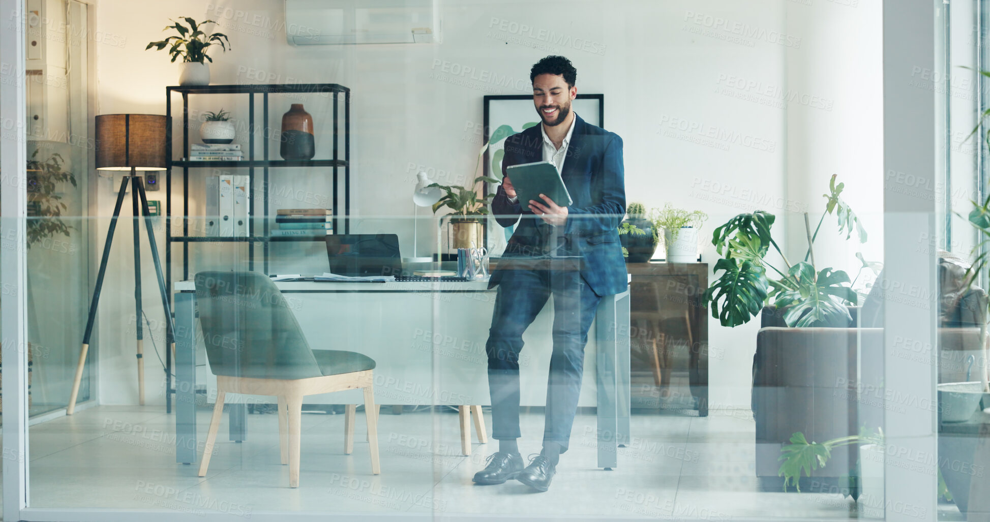 Buy stock photo Businessman, tablet and happy at office with scroll, networking or excited for deal at finance company. Person, broker or advisor with tech, application or smile for notification at investment agency