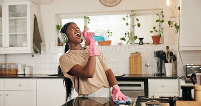 Buy stock photo Cleaning, singing and black woman in kitchen with spray bottle for hygiene, disinfection and bacteria. Housekeeping, karaoke and person with detergents, cloth and gloves for maintenance in home