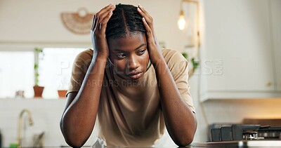 Buy stock photo Thinking, headache and woman with stress in kitchen for burnout, overworked and household pressure. Mental health, tired and black person with depression from fatigue, overwhelmed and burden in home