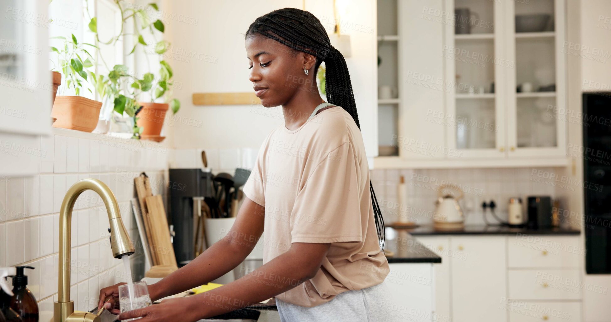 Buy stock photo Home, kitchen and woman with tap water in glass for hydration, natural nutrients or thirsty. Mineral, black person or pour liquid at faucet for refreshing drink, wellness beverage or digestive health