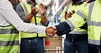 Business people, handshake and logistics with applause for supply chain partnership or distribution. Employees, colleagues or distributor shaking hands with team clapping for shipping in warehouse