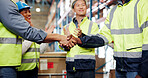 Business people, handshake or logistics with applause for partnership, distribution or supply chain. Employees, colleagues or distributor shaking hands with team clapping for shipping deal in depot