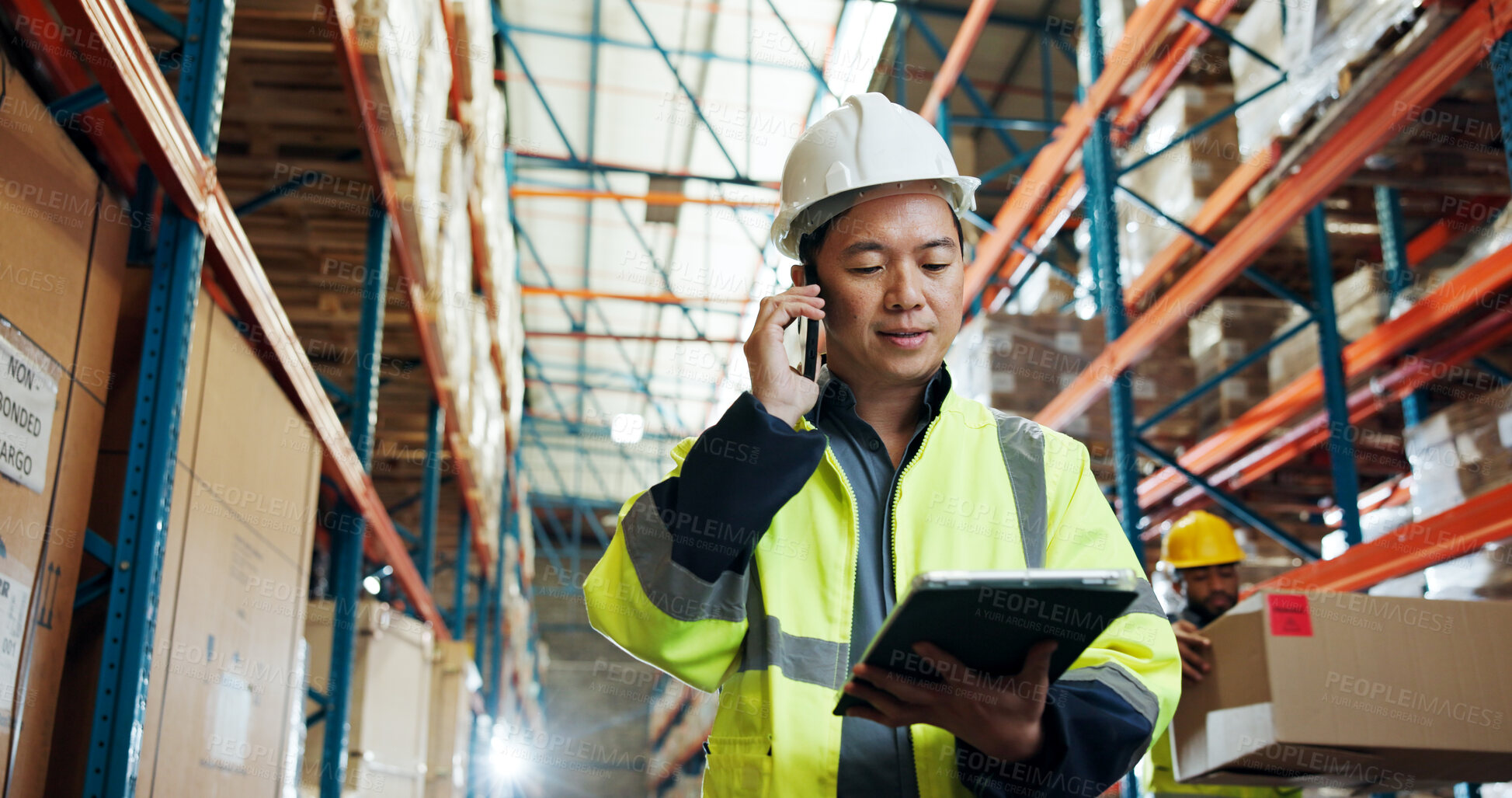 Buy stock photo Man, phone call and tablet at warehouse for logistics, contact and schedule for supply chain job. Person, tech and smartphone for communication, low angle or talk with inventory management at plant