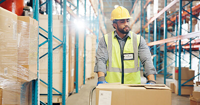 Buy stock photo Logistics, man and walking with cart in warehouse for supply chain, backlog control and shipping. Distribution picker, flare and transport boxes for inventory export, storage management and delivery