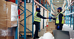 Business people, handshake and boxes with partnership for greeting, teamwork or agreement in depot. Men, employees or colleagues shaking hands with smile for logistics, distribution or supply chain