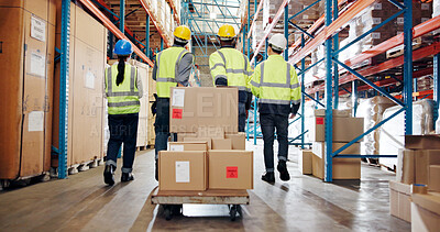 Buy stock photo Logistics, boxes or people with cart in warehouse for package delivery, transport stock or teamwork. Shipping picker, back of group and walking with trolley for inventory export and backlog control