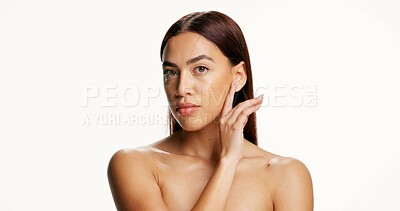 Buy stock photo Woman, skincare and touch face in studio portrait with mockup space, results and beauty on white background. Person, cosmetics and natural makeup with pride, confidence and soft texture in Colombia