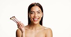 Woman, makeup brushes and smile in studio portrait, foundation and mockup space on white background. Person, cosmetics and happy with equipment, confidence and tools for facial beauty in Colombia