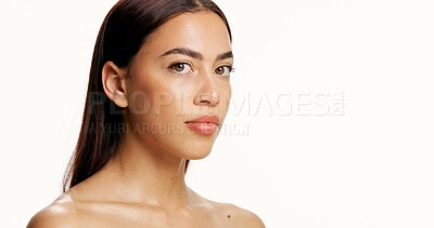 Buy stock photo Beauty, cosmetics and portrait of serious woman on studio space for dermatology or skincare. Aesthetic, mockup and self care with confident model isolated on white background for facial results