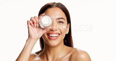 Buy stock photo Beauty, cream jar and portrait of woman on a white background for wellness, facial and health. Dermatology, mockup space and person with cosmetics, lotion and skincare for collagen benefits in studio