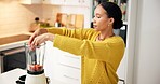 Kitchen, smoothie and woman with fruit in blender in morning for healthy drink, diet and detox. Home, protein shake and person with ingredients, berries and food for nutrition, wellness and vitamins