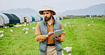 Agriculture, man and tablet on chicken farm for inspection, livestock health and monitor growth. Poultry industry, farmer and tech in countryside for agro business, egg production and quality control