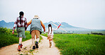 Holding hands, parents or child with kite in countryside for bonding, love or play outside for vacation. Connection, grass field or happy people support girl on holiday, back or space on weekend