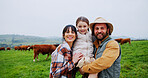 Portrait, countryside or parents hug child for relationship, love or cattle farm for weekend vacation. Connection, cows or happy people support girl on holiday, embrace or outdoor bonding with space
