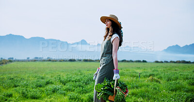 Buy stock photo Walking, farmer and woman with carrots, harvest and natural produce for sustainable business or farm. Outdoor, person and vegetables in countryside, gardening and growth for agriculture and space