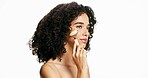 Woman, jade roller and skincare with facial in studio for anti aging on a white background. Female person, model or makeup with beauty tool for lymphatic drainage or face massage on mockup space