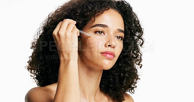 Buy stock photo Woman, dropper and skincare with serum in studio for hydration or retinol on a white background. Female person, model or applying liquid with pipette for vitamin A oil, anti aging or facial cosmetics