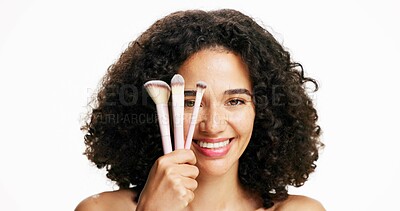 Buy stock photo Cosmetics, brushes and portrait of woman in studio for beauty, makeup and self care routine. Smile, face tools and female person with facial cosmetology treatment by white background from Brazil.