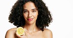 Happy woman, portrait and skincare with lemon for vitamin C on a white studio background. Female person, model or smile with natural organic cirtrus fruit for antioxidant, diet or detox on space