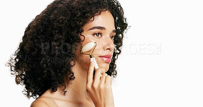 Buy stock photo Woman, jade roller and skincare with facial massage in studio for anti aging on a white background. Person, model or cosmetics with beauty tool for lymphatic drainage or results on mockup space