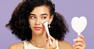 Buy stock photo Woman, beauty and makeup brush with mirror in studio for cosmetics on a purple background. Female person, model or applying blush with reflection or face contour for foundation, skin glow up or shine