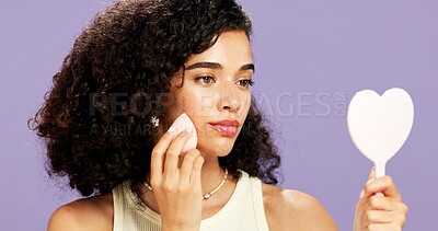 Buy stock photo Beauty, sponge and mirror with woman in studio for foundation, aesthetic and self care. Blush cosmetics, cosmetology and gen z glow with person and tools on purple background space for makeup