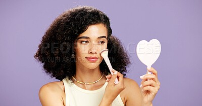 Buy stock photo Makeup, brush and mirror with woman in studio for foundation, aesthetic or self care. Blush cosmetics, cosmetology and gen z glow with person and tools on purple background for shine and beauty